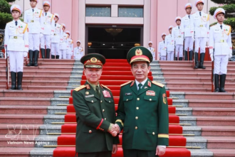 Vietnam, Laos strengthen defence cooperation